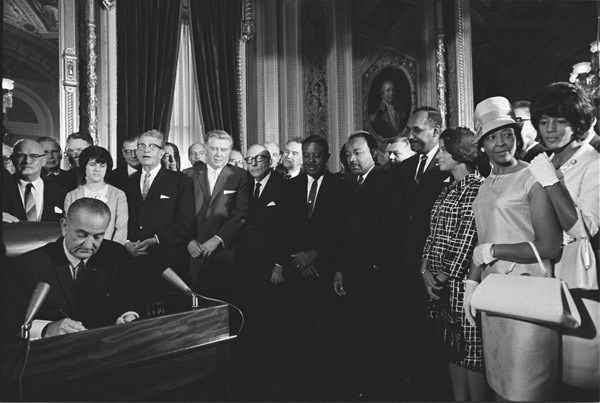 President john f kennedy signing the bill of rights.